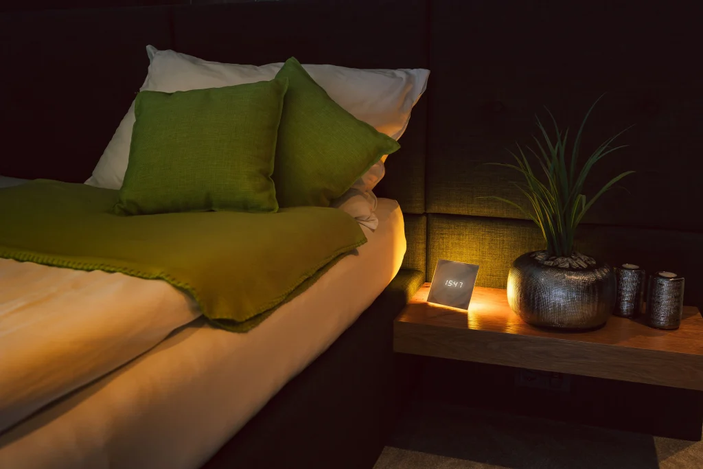 Loxone Air wireless nightlight device in a residential bedroom setting