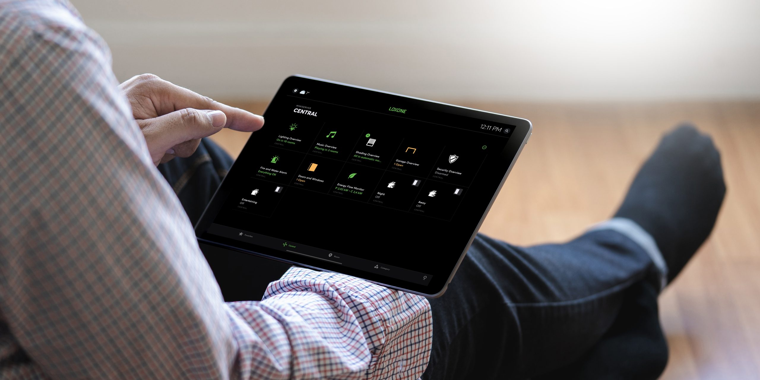 Loxone App on a tablet showing home and building automation controls